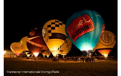 Zahlreiche atemberaubende Heißluftballons beim traditionellen Night Glow.