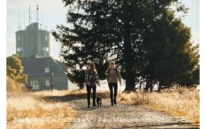 Two women hiking with their dog on the Kahler Asten.