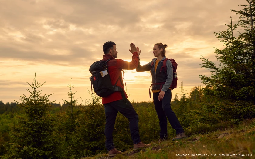 A couple on the Rothaarsteig long-distance hiking trail.