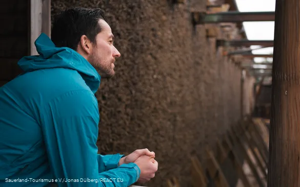 A man takes a deep breath at the Gradierwerk