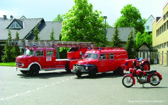 Old historic fire engines in front of the fire department museum in Attendorn.