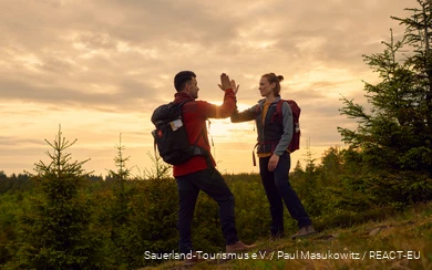 A couple on the Rothaarsteig long-distance hiking trail.