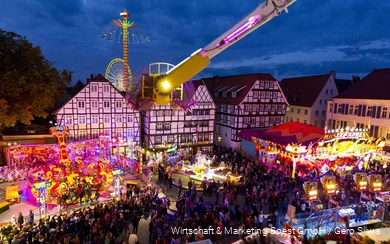 View of the colorful hustle and bustle at the Soest All Saints' Fair.