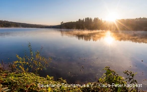 Sunrise at Hevesee in the Arnsberg Forest Nature Park.