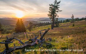 Kahle Pön and vast landscape at sunset.