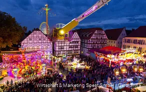 View of the colorful hustle and bustle at the Soest All Saints' Fair.