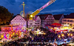 View of the colorful hustle and bustle at the Soest All Saints' Fair.