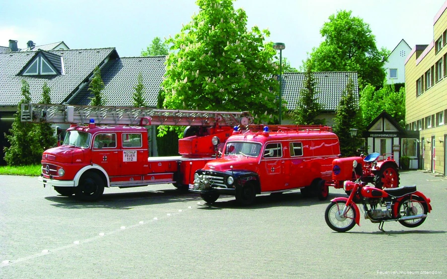 Old fire engines Old historic fire engines in front of the fire department museum in Attendorn.