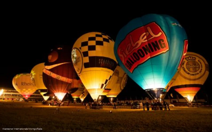 Numerous breathtaking hot air balloons at the traditional Night Glow.