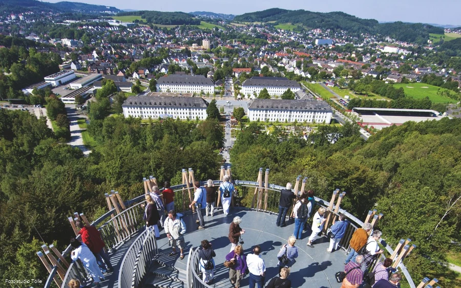 Juebergtower People enjoy the view from the Jübergturm tower over the town of Hemer.