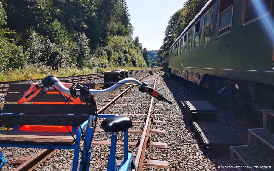 A trolley stands on the tracks.