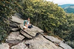 Simone Schwerdtner with dog at the viewpoint