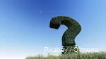 An oversized question mark made of plants above a field.