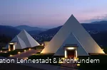 View of the illuminated Sauerland pyramids in the evening.