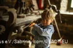Child playing on a scraper