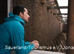 A man takes a deep breath at the Gradierwerk