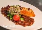 Roasted salmon with tasty side dishes.