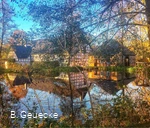 Die Mühle spiegelt sich im Mühlenteich