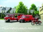 Old historic fire engines in front of the fire department museum in Attendorn.