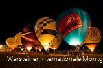 Zahlreiche atemberaubende Heißluftballons beim traditionellen Night Glow.