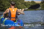 Man and a child canoeing