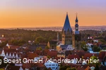 Aerial view of Soest with church in the center and orange sunset sky